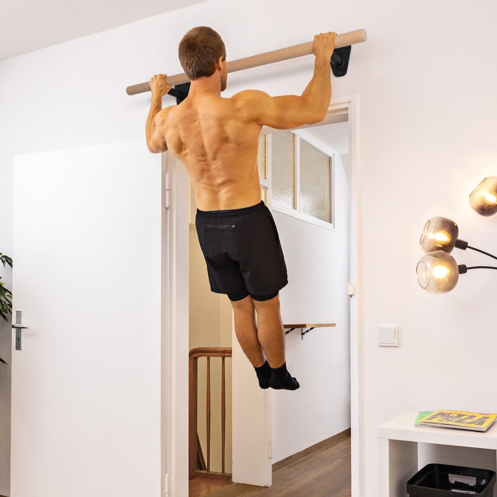 Barra de dominadas de madera para montaje en pared por encima del marco de la puerta