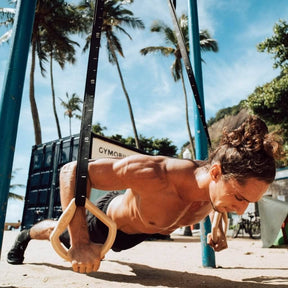 Juego de anillas de calistenia "TRINGS" con correas, anclaje para puerta y bolsa de transporte